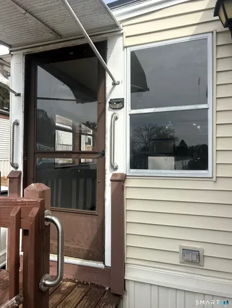 a view of front door and porch