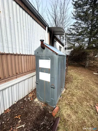 a view of a house with a small yard