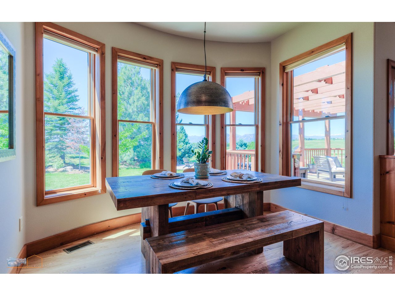 9428 Gunbarrel Ridge Road Boulder, CO 80301 - Photo 16 of 40 Eat-in kitchen nook looking out to the mountains