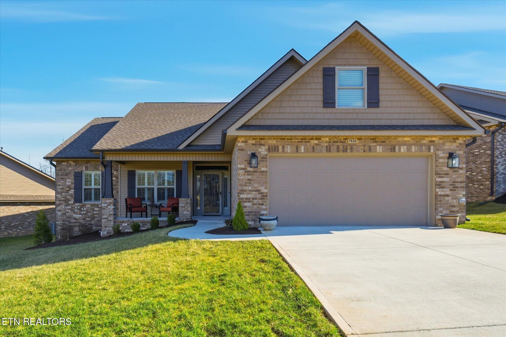 a front view of a house with a porch