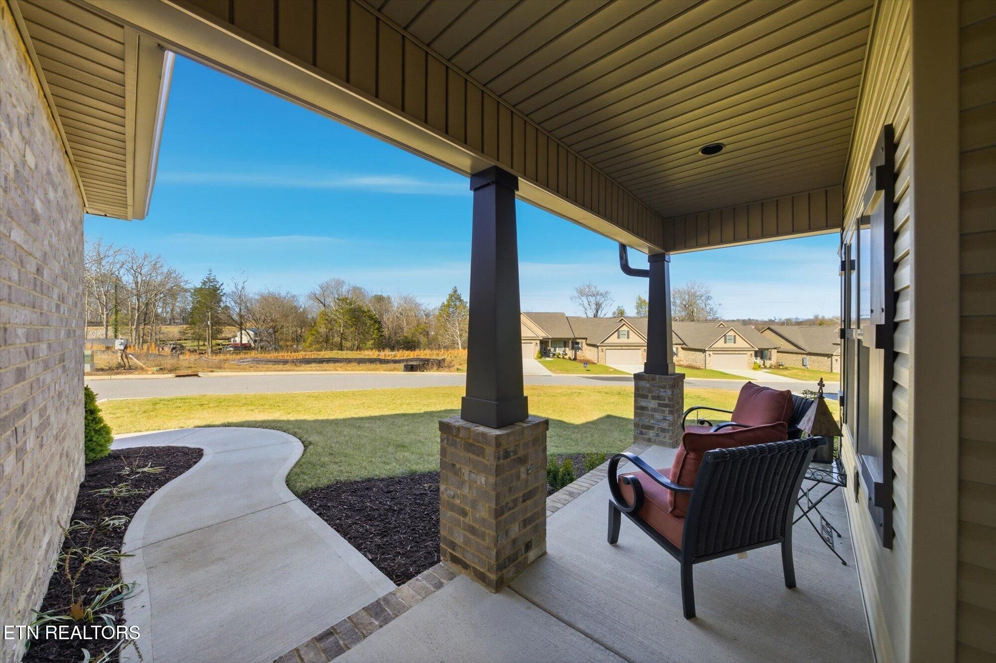 7122 Volunteer Rdg Lane Knoxville, TN 37918 - Photo 4 of 34 a view of swimming pool with outdoor seating