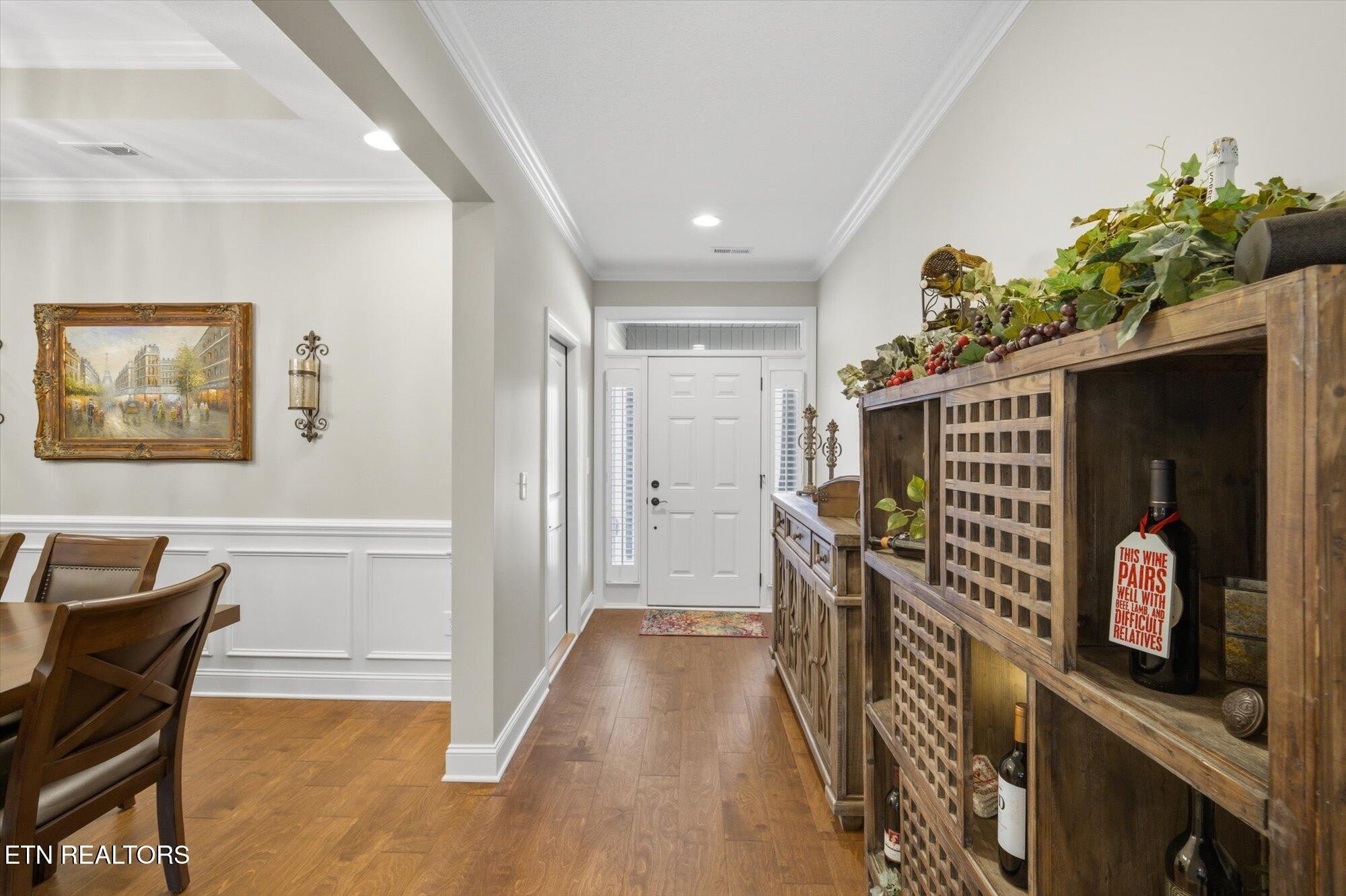 7122 Volunteer Rdg Lane Knoxville, TN 37918 - Photo 5 of 34 a view of hallway with furniture and a chandelier
