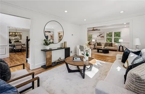 a view of a dining room with furniture window and outside view