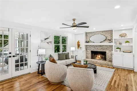 a kitchen with a refrigerator and cabinets
