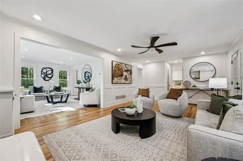 a kitchen with a refrigerator and cabinets