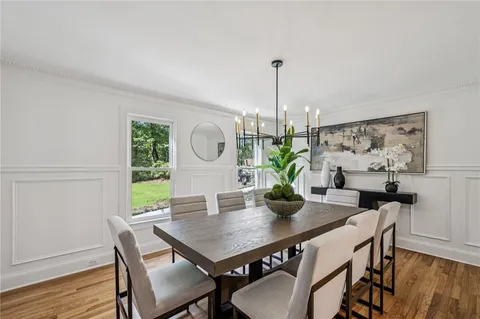 a bathroom with a granite countertop sink mirror and a
