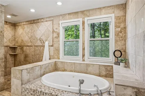 a view of a roof deck with wooden floor and fence