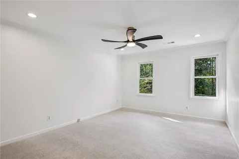 a view of a town with mountains in the background