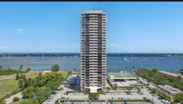 a view of a lake with a multi story building