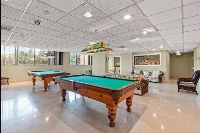 a kitchen with a stove and a refrigerator