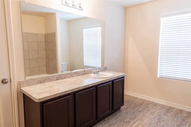 a kitchen with a sink and a window