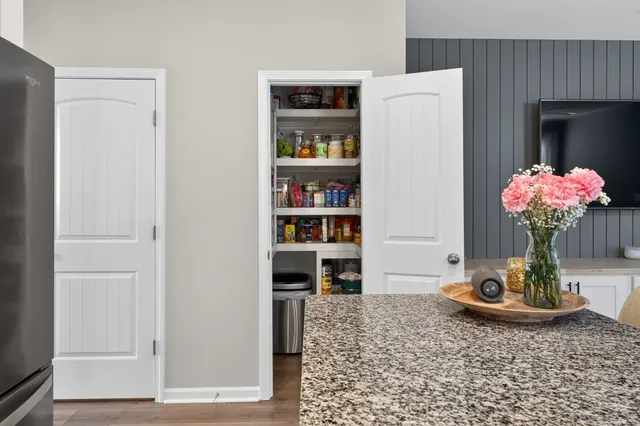 a vase of flowers sitting on a table