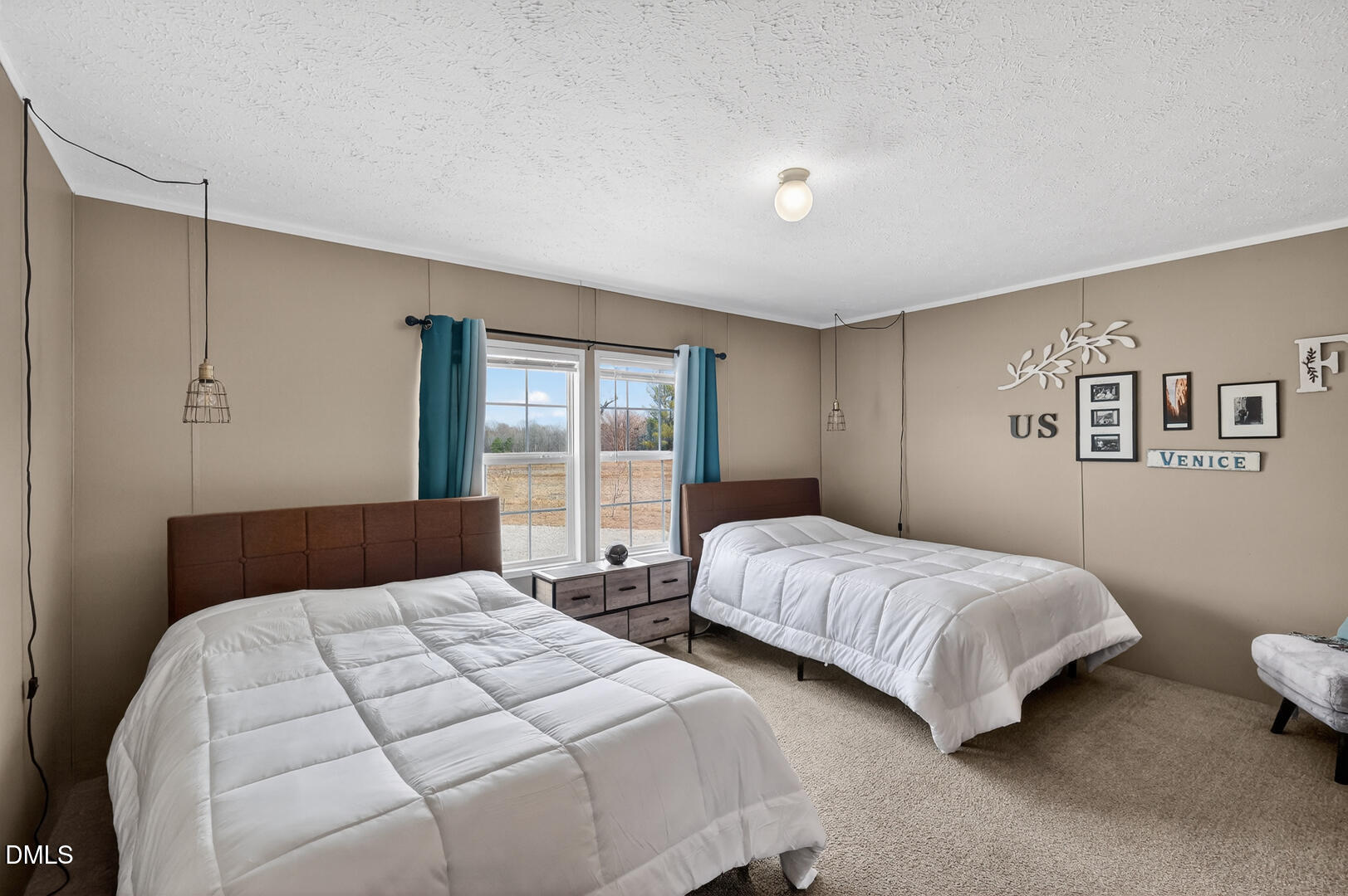 540 Pine Ridge Road Zebulon, NC 27597 - Photo 65 of 96 a bedroom with two beds and a large window