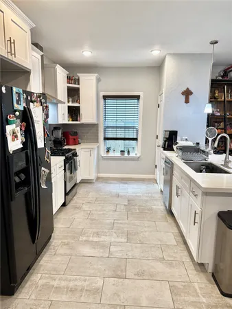 a view of a workspace with furniture