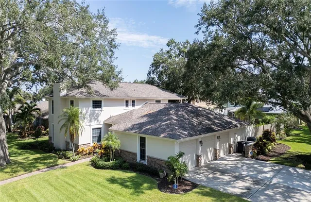 a front view of house with yard outdoor seating and green space