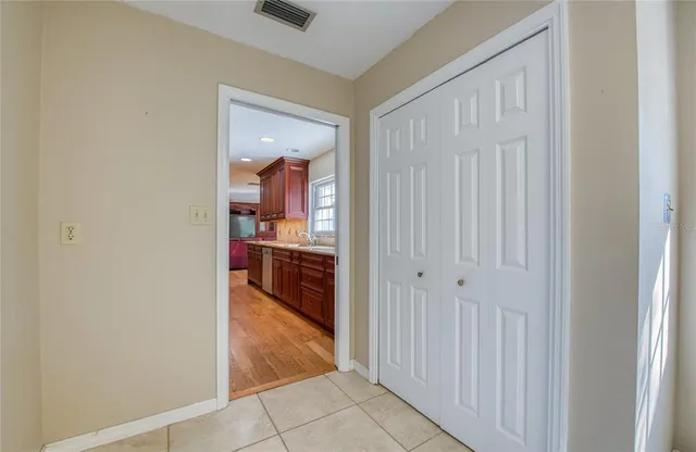 a view of empty room with windows