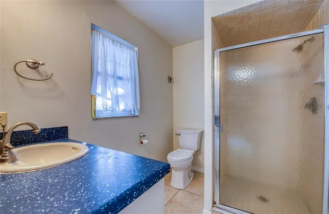 a view of a porch with wooden floor and outdoor space