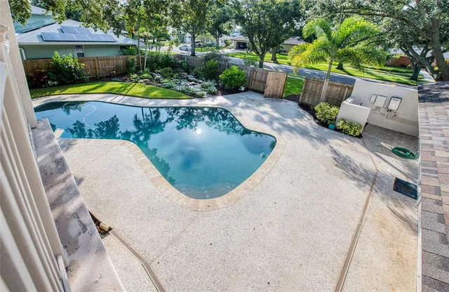 a backyard of a house with lots of green space