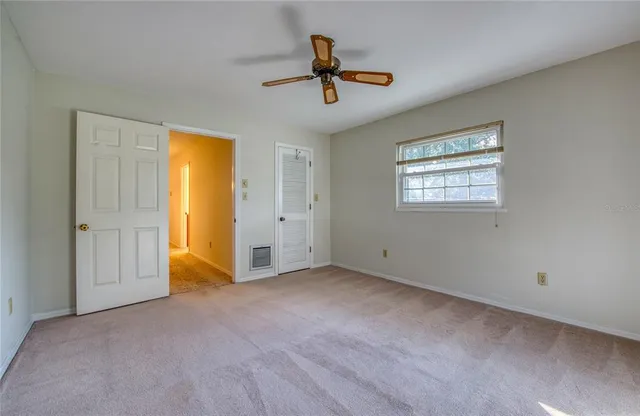 an aerial view of lake and residential houses with outdoor space and lake view