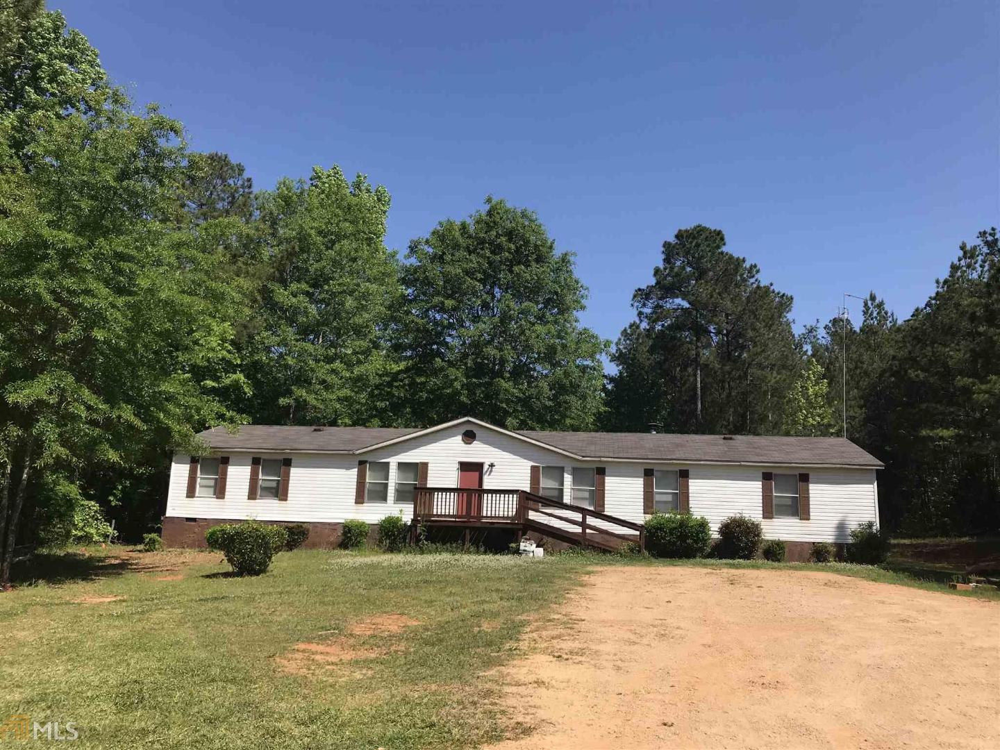 234 Jarrell Hogg Road West Point, GA 31833 - Photo 1 of 1 a front view of a house with a yard