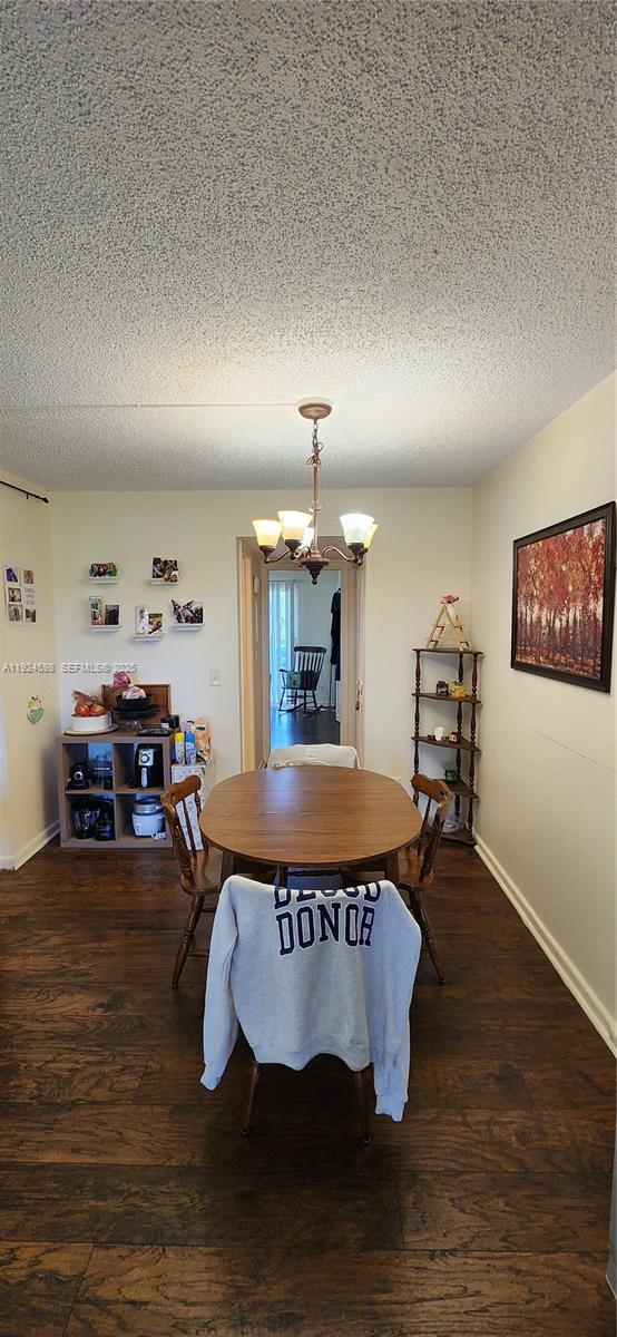 191 Preston Way, Unit 191 Boca Raton, FL 33434 - Photo 7 of 13 a living room with furniture and a wooden floor