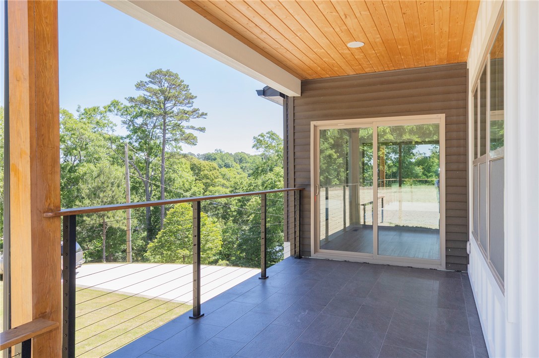 230 Hammond Circle Anderson, SC 29621 - Photo 43 of 48 Enjoy outdoor living on this elevated patio with panoramic tree-lined views.