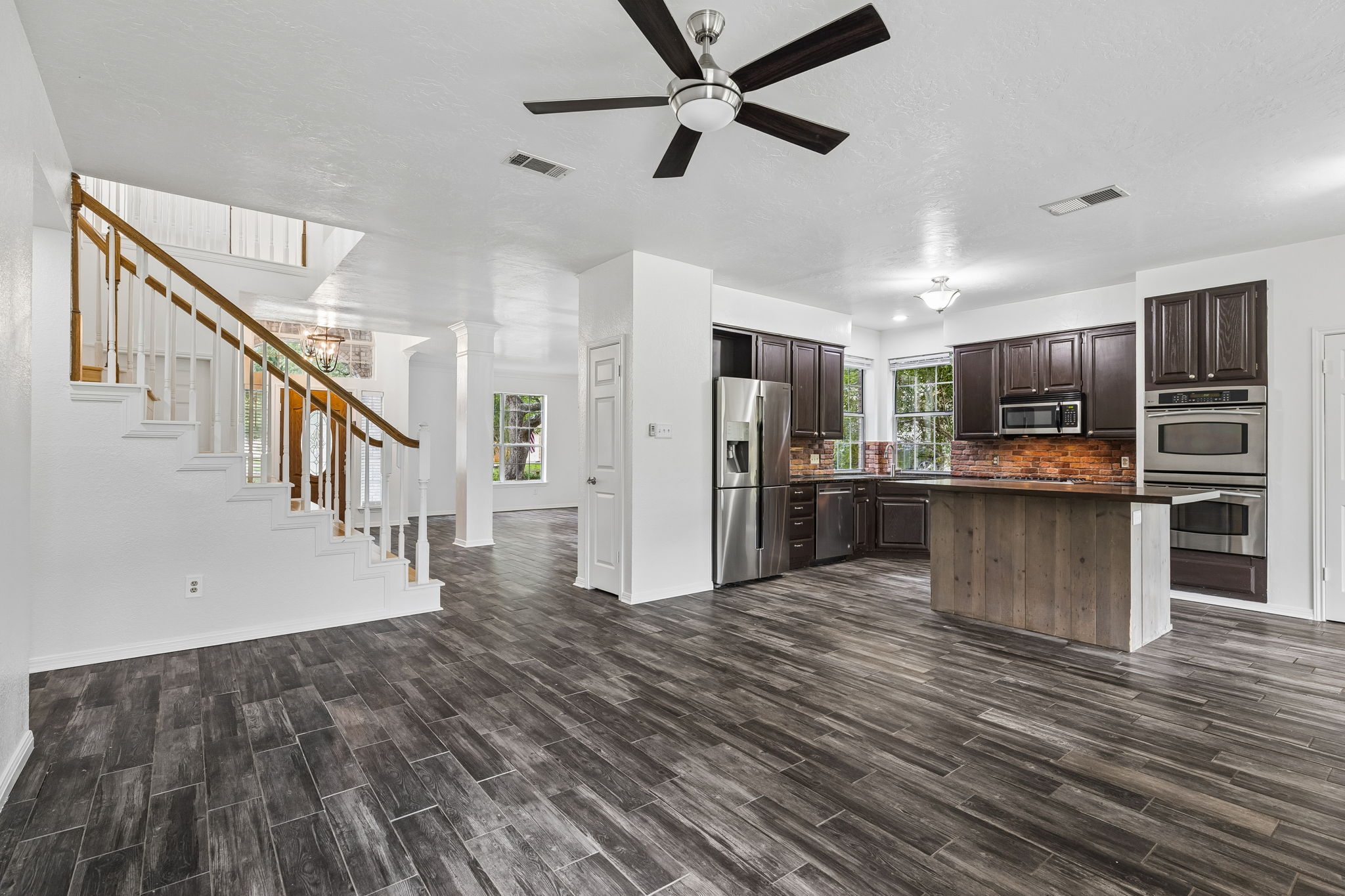 10400 O'Rourk Lane Austin, TX 78739 - Photo 26 of 33 a view of kitchen with cabinets and stainless steel appliances