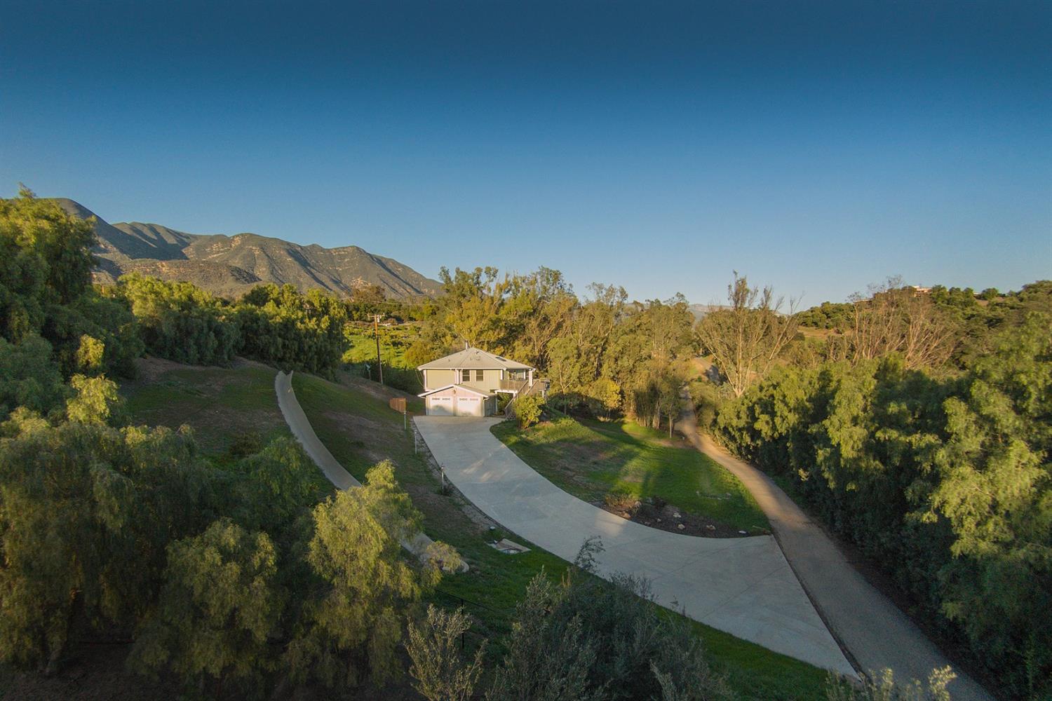 304 Fairview Road Ojai, CA 93023 - Photo 1 of 32 a view of a lake with a mountain in the background