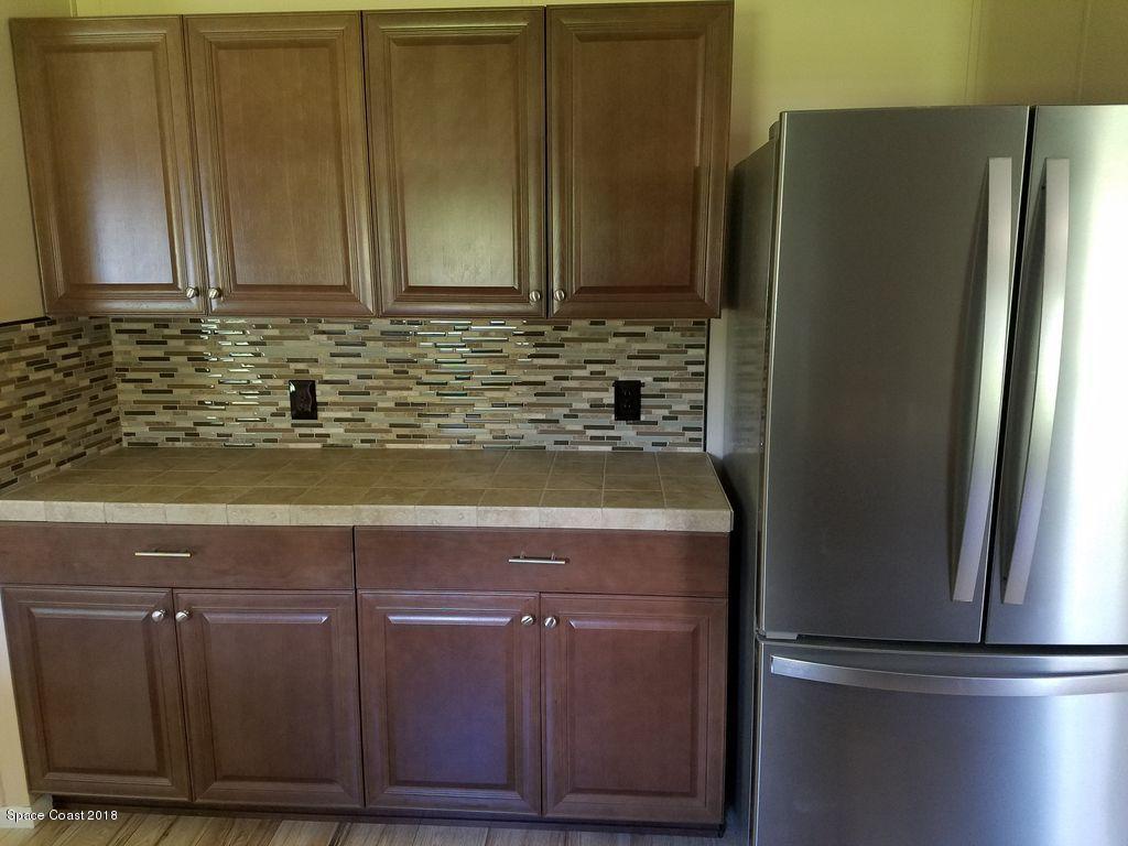 2825 Brockett Road Mims, FL 32754 - Photo 9 of 52 ISy70poit7fy6t0000000000