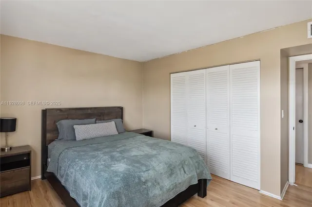 a bathroom with a bathtub shower sink and toilet