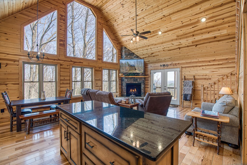 40 Reitzel Rdg Trail Murphy, NC 28906 - Photo 11 of 54 a living room with furniture a fireplace and wooden floor