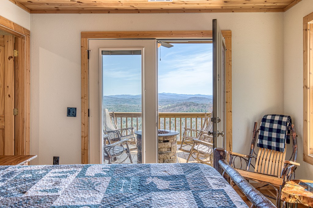 40 Reitzel Rdg Trail Murphy, NC 28906 - Photo 21 of 54 a bedroom with a bed and wooden floor