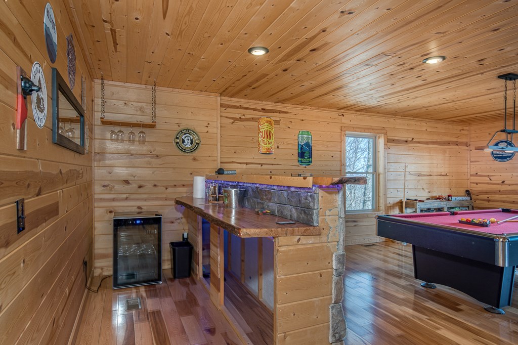 40 Reitzel Rdg Trail Murphy, NC 28906 - Photo 38 of 54 a kitchen with stainless steel appliances granite countertop a stove and a wooden floors
