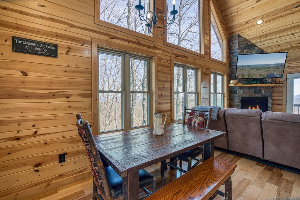 40 Reitzel Rdg Trail Murphy, NC 28906 - Photo 8 of 54 a view of a deck with table and chairs with wooden floor and fence
