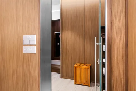 a view of an empty room with empty shelves