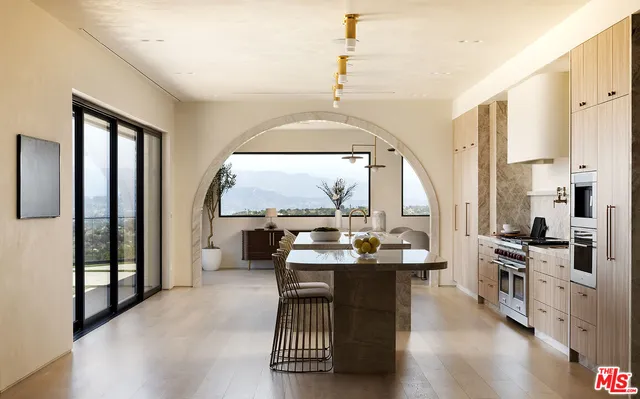 a view of a living room and a chandelier
