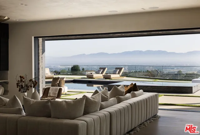 a view of a living room with furniture