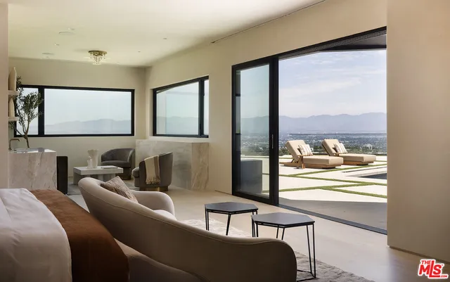 a bathroom with a bathtub and a sink