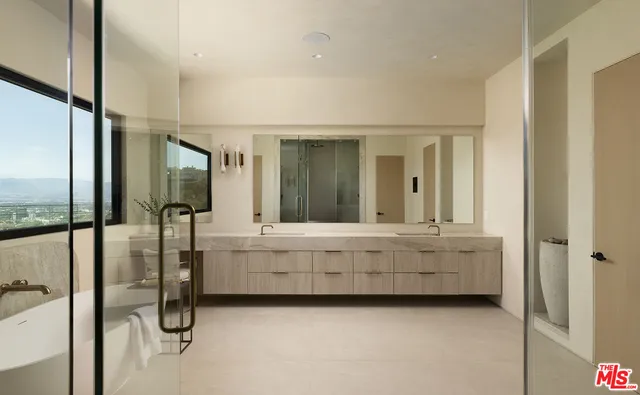 a kitchen with stainless steel appliances a refrigerator and a stove