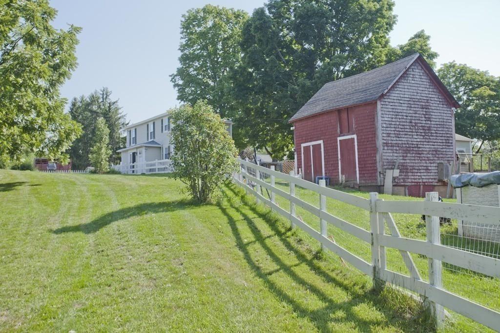 2018 Oak Street Three Rivers, MA 01080 - Photo 5 of 42 a view of a house with a backyard