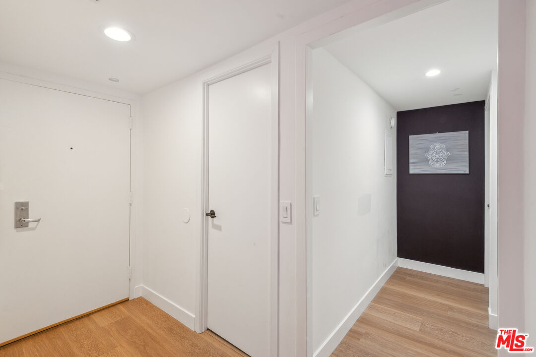 7250 Franklin Avenue, Unit 512 Los Angeles, CA 90046 - Photo 17 of 28 a view of hallway with wooden floor