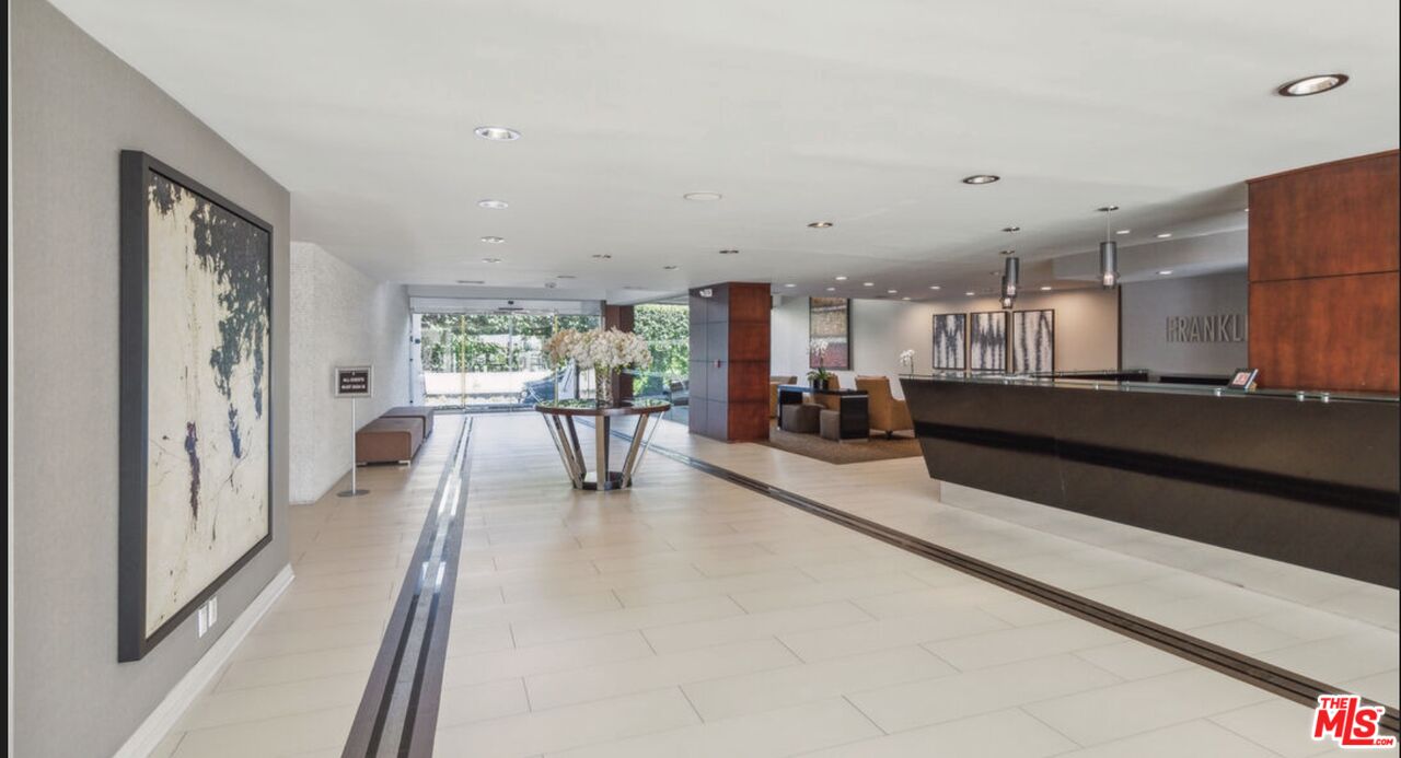 7250 Franklin Avenue, Unit 512 Los Angeles, CA 90046 - Photo 23 of 28 a lobby with furniture and floor to ceiling window
