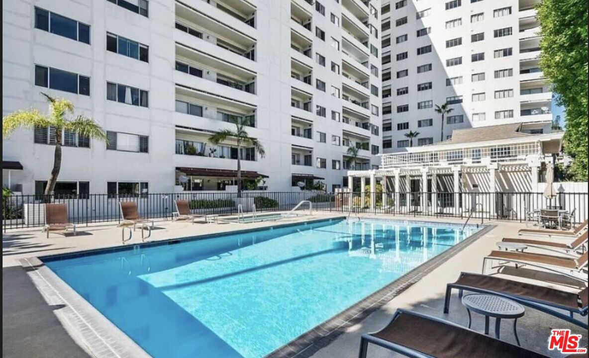 7250 Franklin Avenue, Unit 512 Los Angeles, CA 90046 - Photo 25 of 28 a view of a swimming pool with a deck