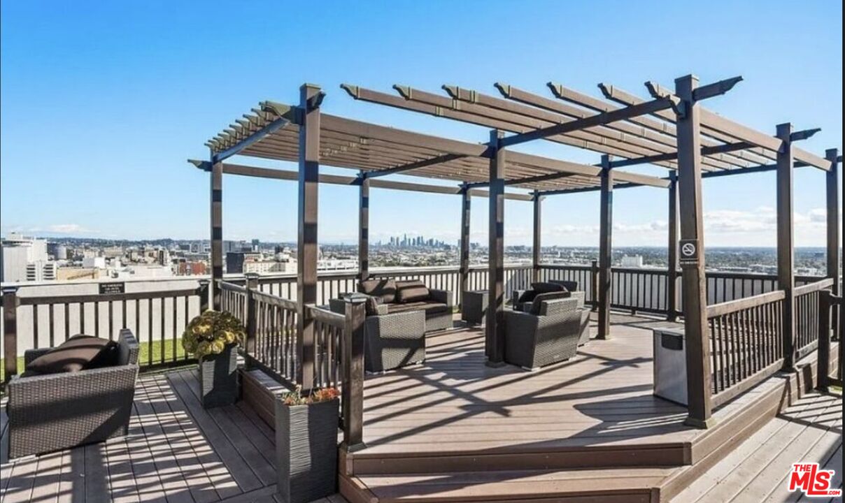 7250 Franklin Avenue, Unit 512 Los Angeles, CA 90046 - Photo 27 of 28 a view of a balcony with furniture