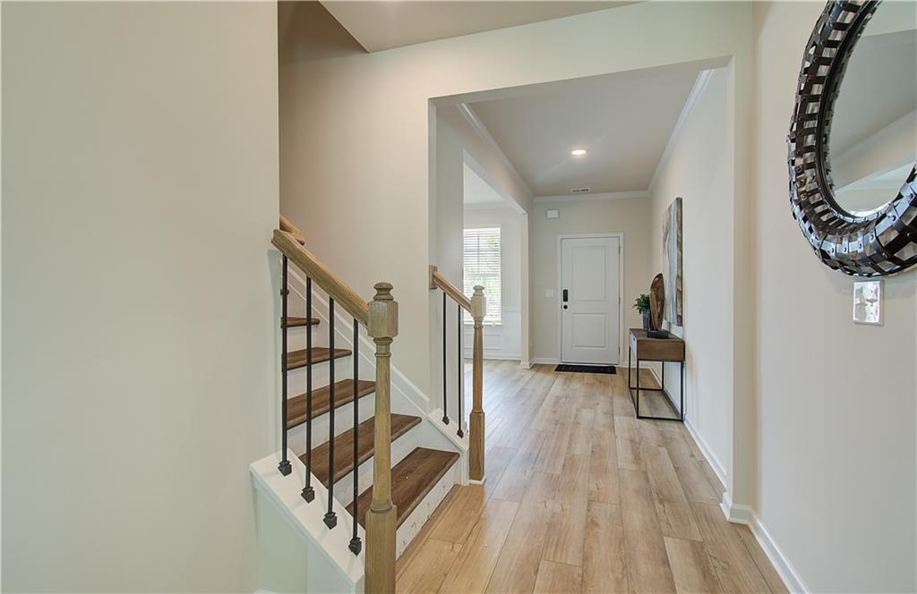 477 Collier Mls Road Lawrenceville, GA 30045 - Photo 9 of 40 a view of entryway with wooden floor