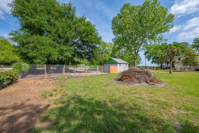 a view of backyard with green space