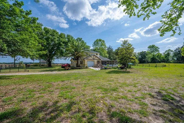 a view of a house with a big yard