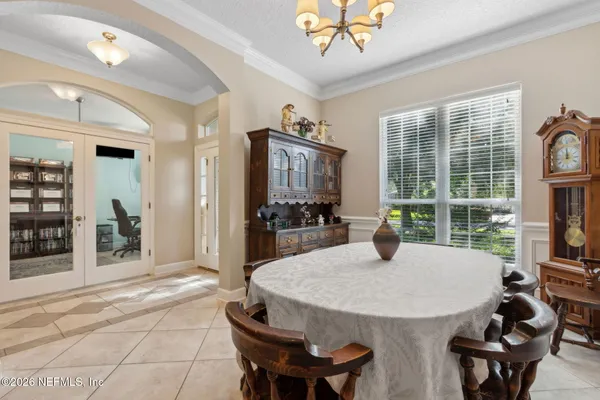 a kitchen with stainless steel appliances granite countertop a refrigerator and a stove