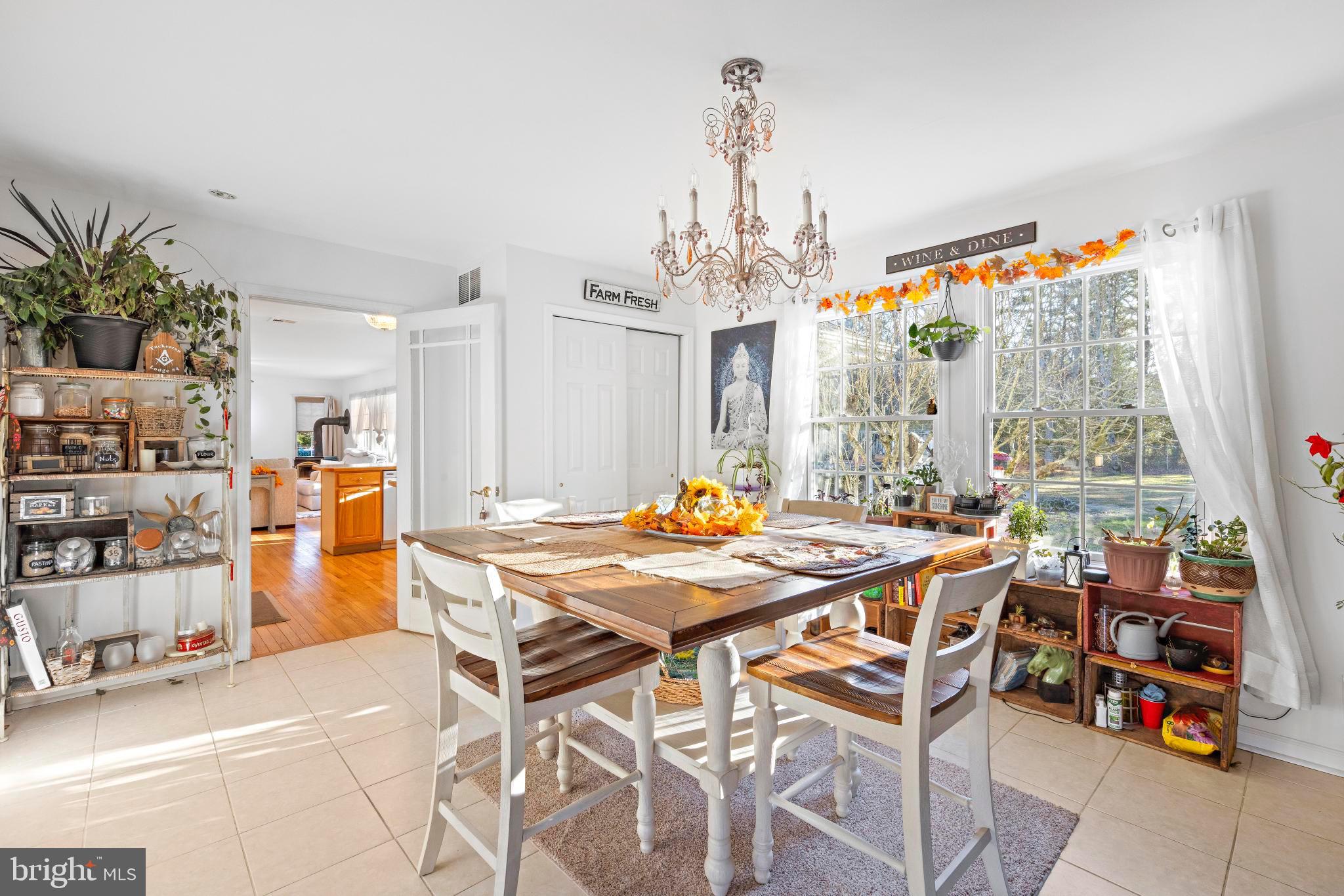 3 Hay Road Tuckerton, NJ 08087 - Photo 17 of 50 a view of a dining room with furniture and a chandelier