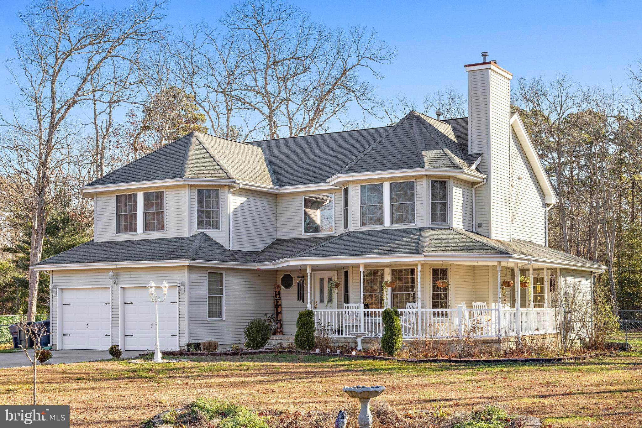 3 Hay Road Tuckerton, NJ 08087 - Photo 2 of 50 a front view of a house with a yard and lake view